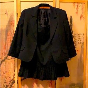 Size 10 ANTONIO MELANI navy skirt suit set.